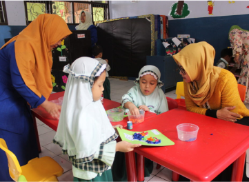 Parents and children participating in activities together
